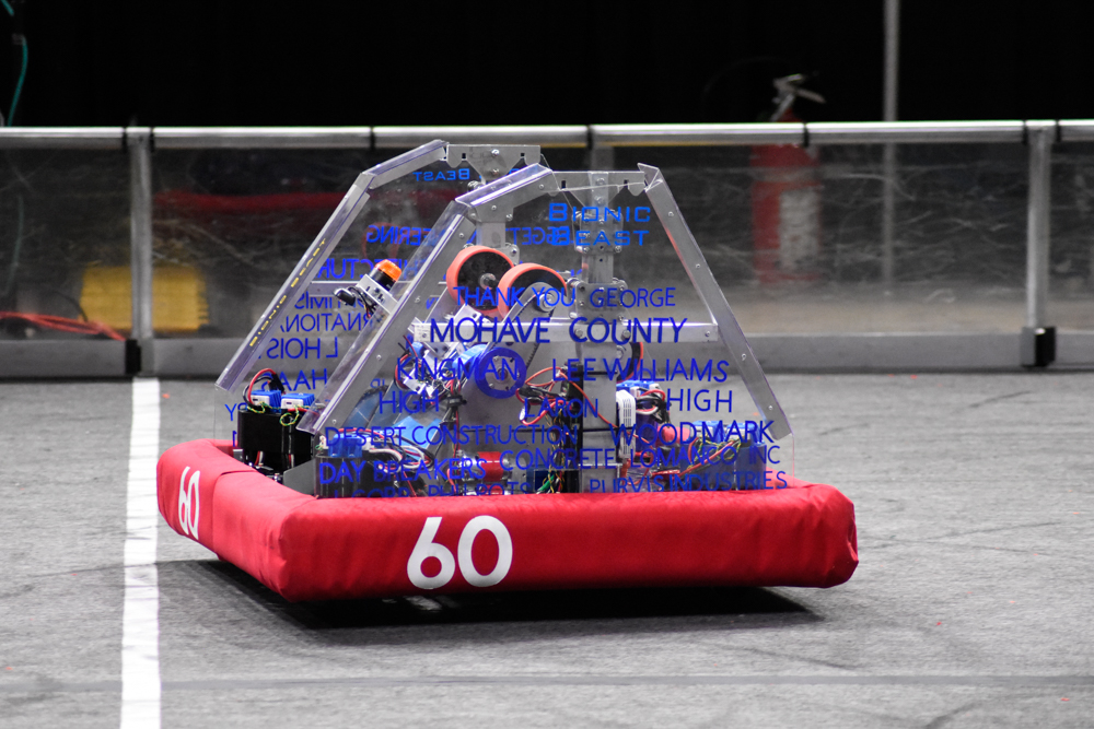 2024 robot scoring a ring into the goal