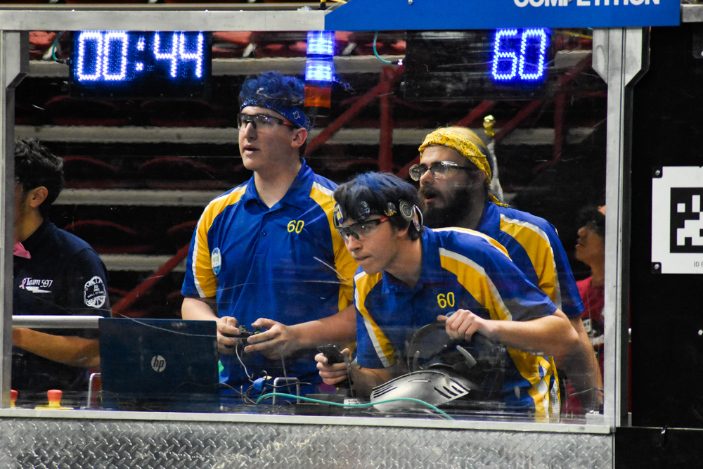 2024 robot scoring a ring into the goal